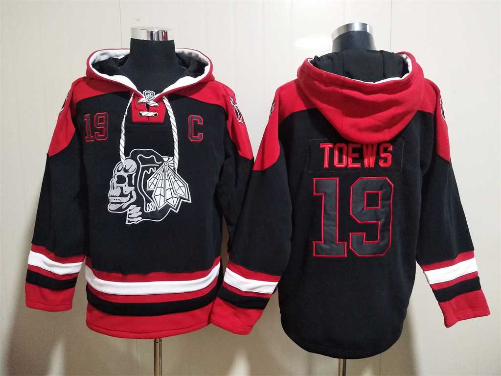 Blackhawks 19 Jonathan Toews Black Skull All Stitched Pullover Hoodie,We sell and wholesale Blackhawks 19 Jonathan Toews Black Skull All Stitched Pullover Hoodie on line form chian!